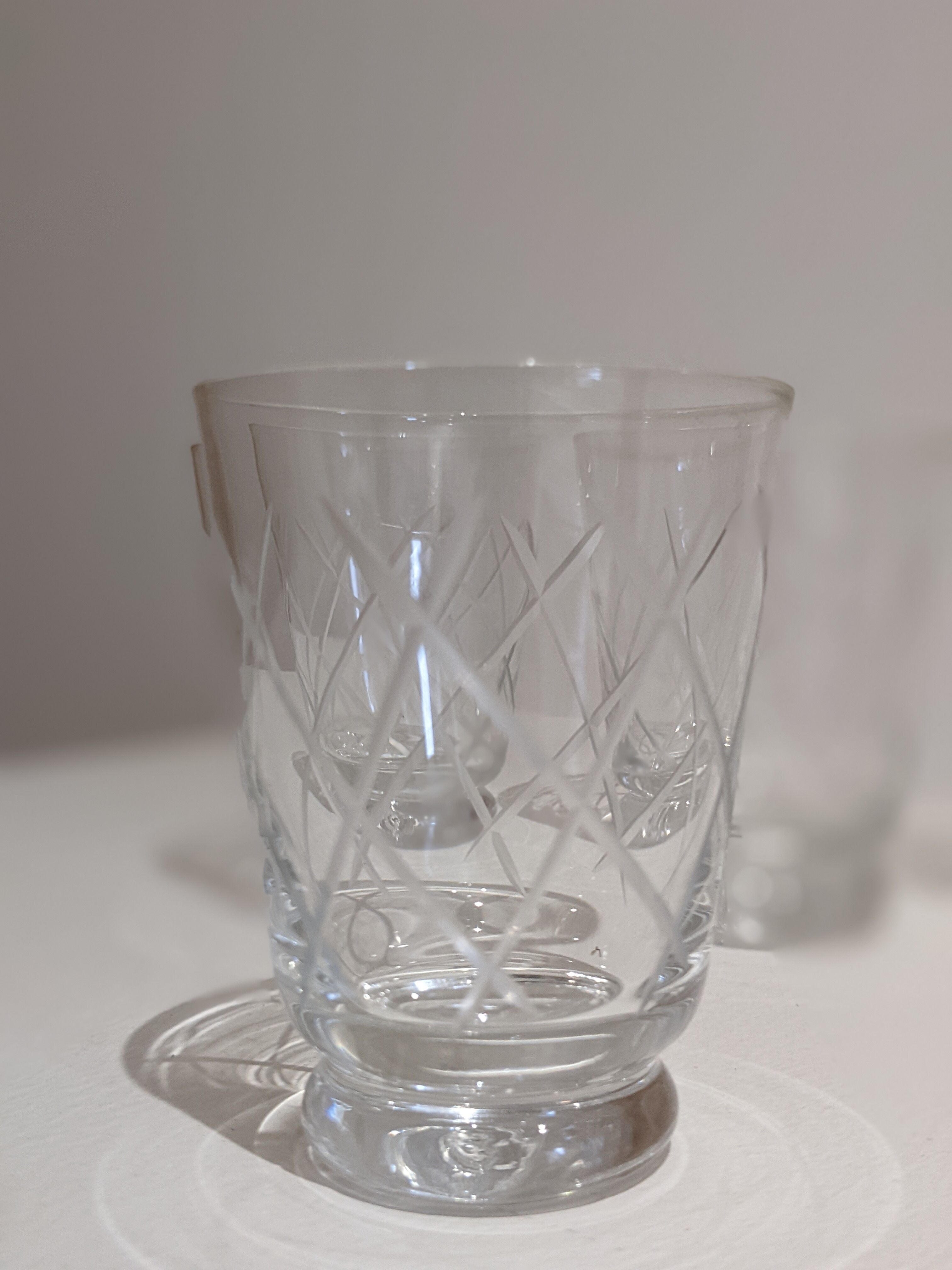 Small cups chiseled in vintage antique crystal