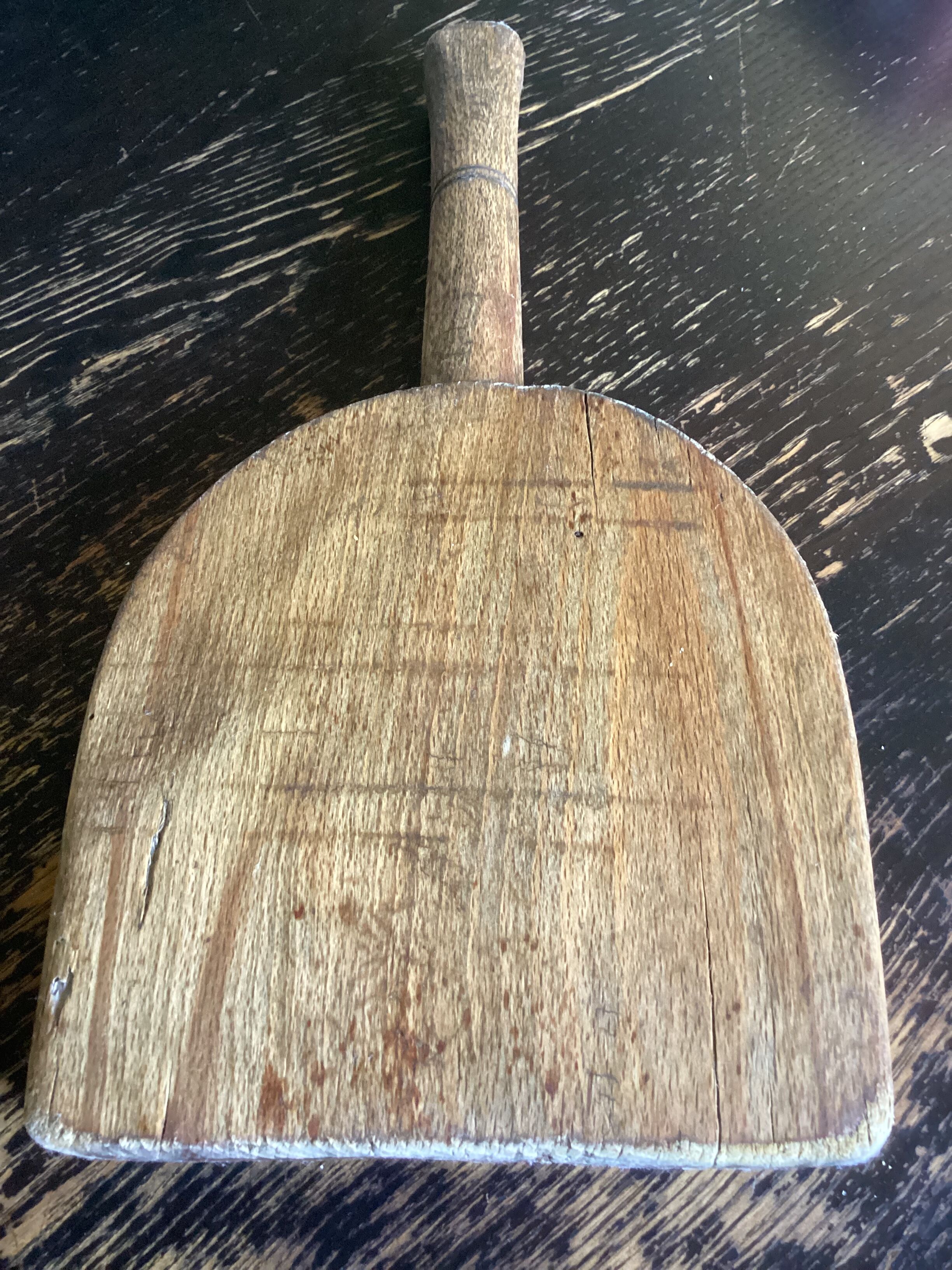 Old wooden clothes beater