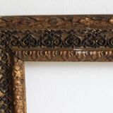 Cadre ancien à moulures noires et dorées