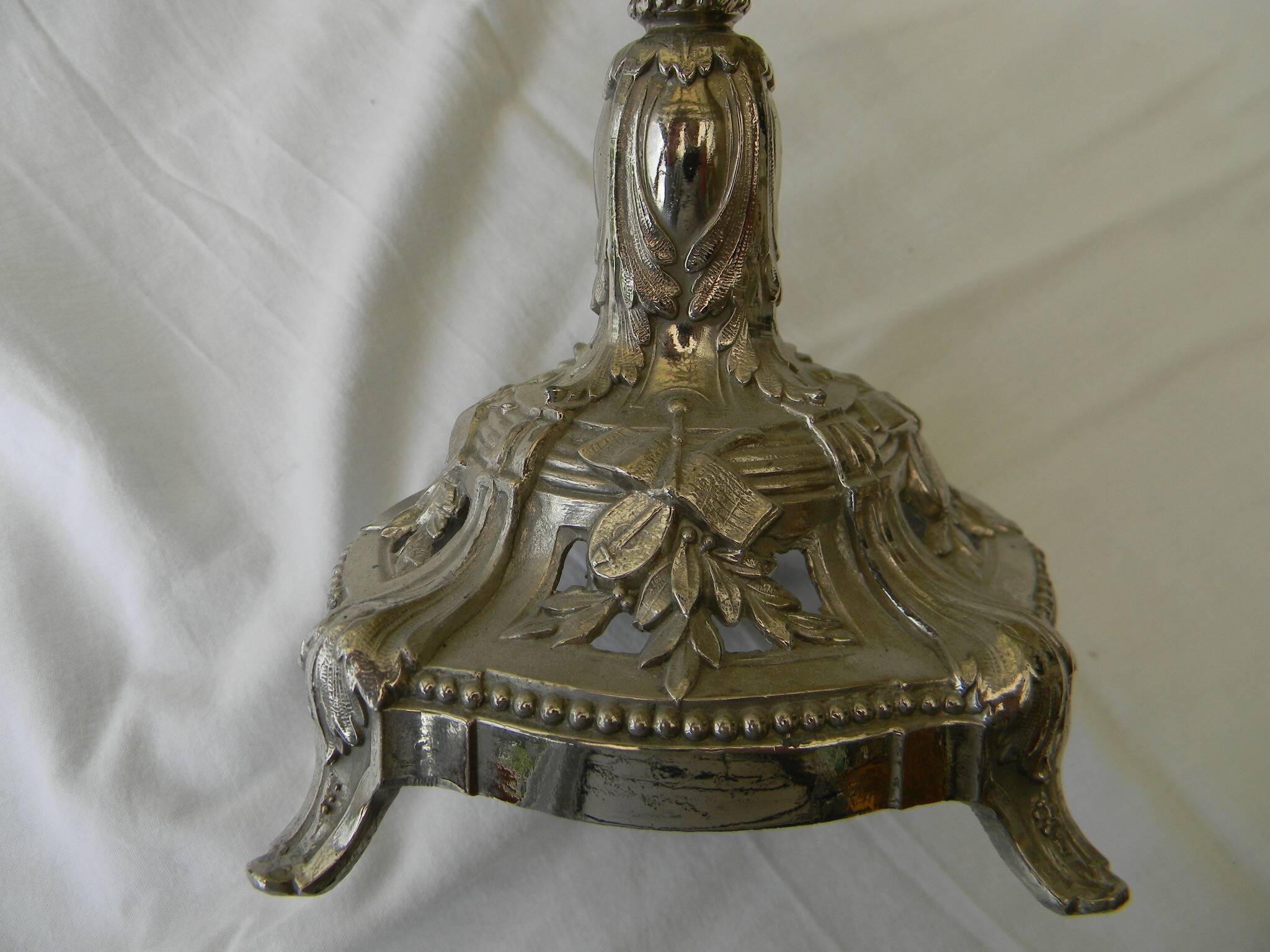 Large smoked glass fruit bowl with a metal base.