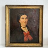 Old oil painting on canvas portrait of a woman with a red bow, late 19th century