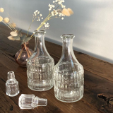 2 small bottles / glass bottles with caps