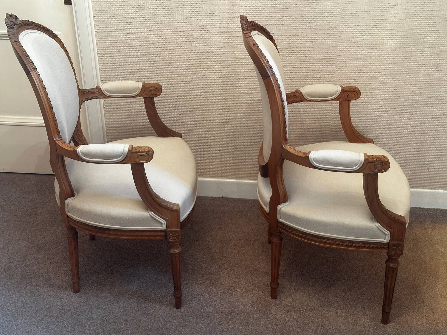 Pair of Louis XVI style medallion armchairs, late 19th / early 20th century.