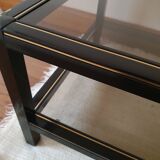Black and gold coffee table with a double smoked glass top