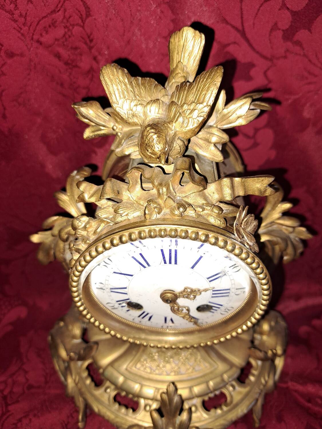 Clock, cartel in gilded bronze. Louis XV