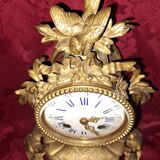 Clock, cartel in gilded bronze. Louis XV