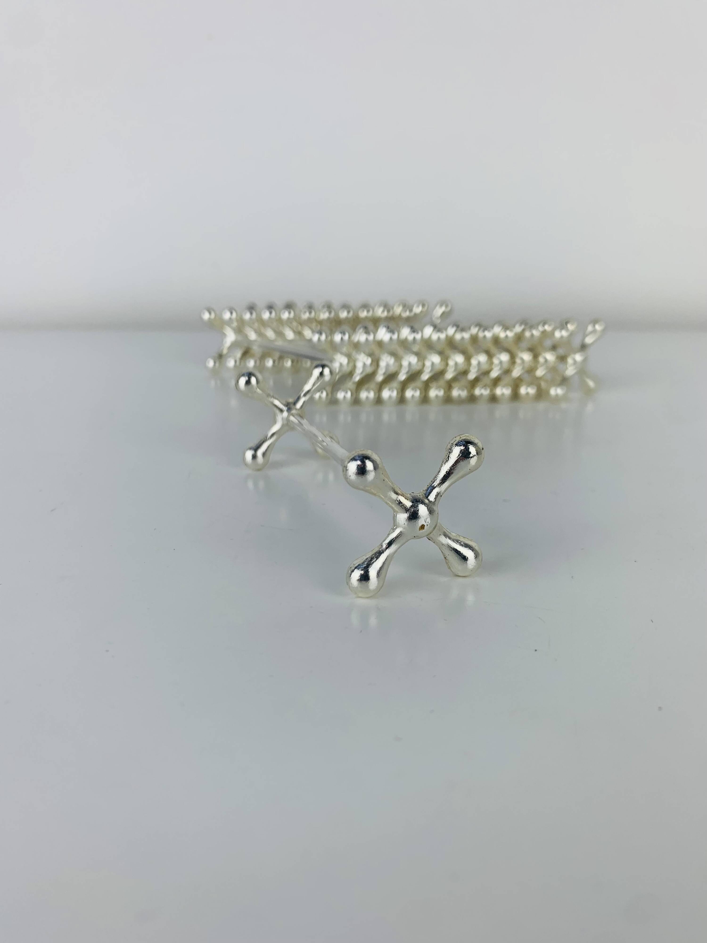 12 space age silver-plated knife rests by WMF, 1970