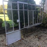 Old glass roof with door and window
