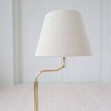 Sculptural modern brass floor lamps from the mid-century Luxus, Sweden, 1970s.