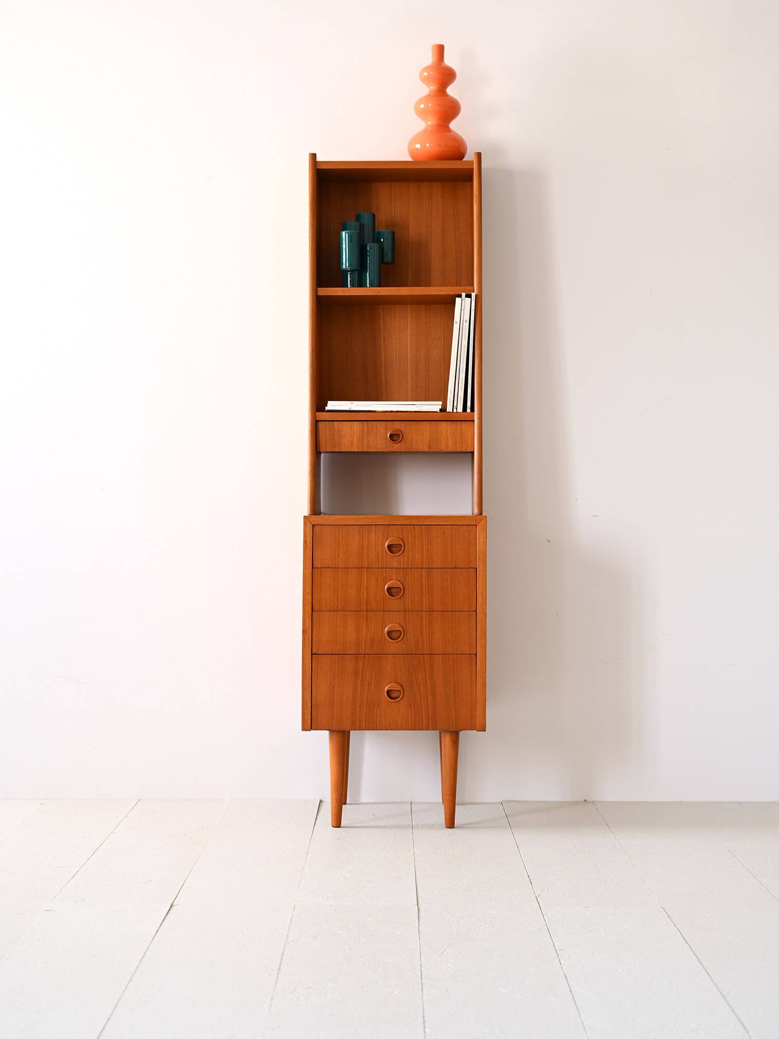 Fine teak bookcase with drawers