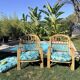 Paire de fauteuils en rotin "Audoux-Minnet" 1960