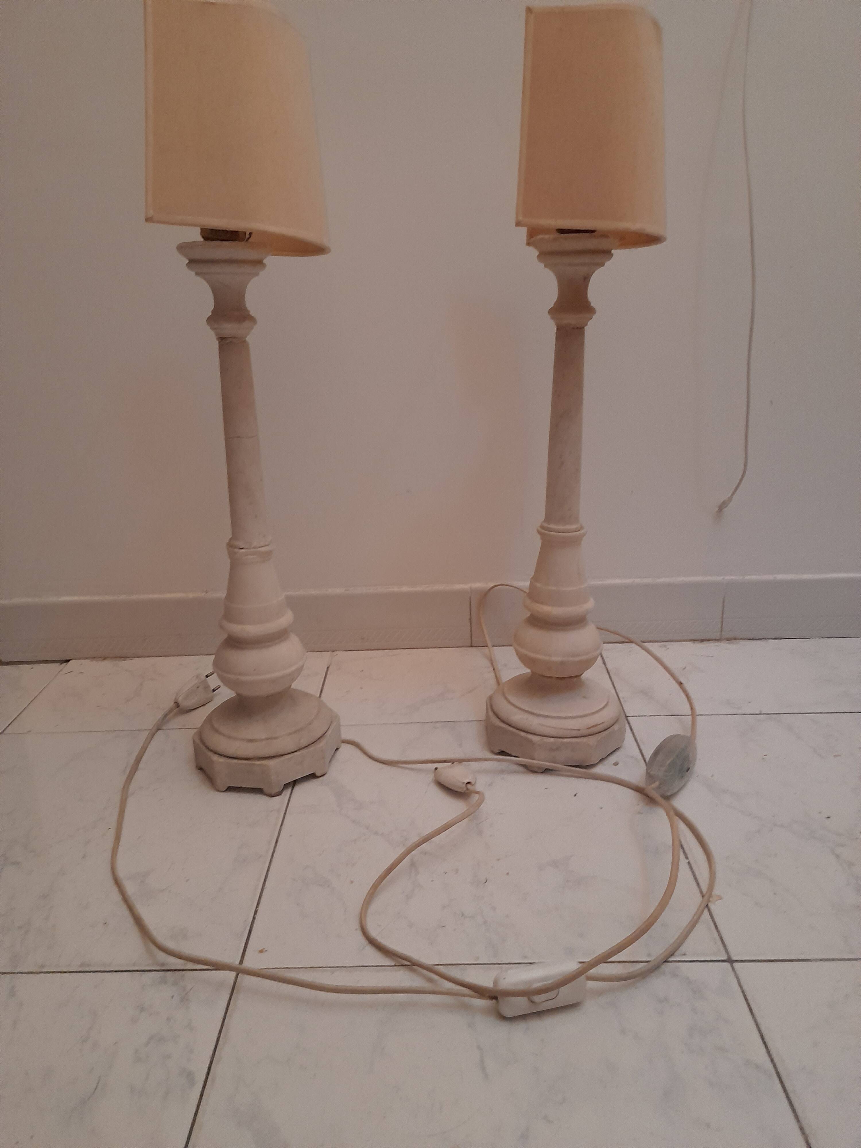 A pair of antique desk lamps with white marble bases