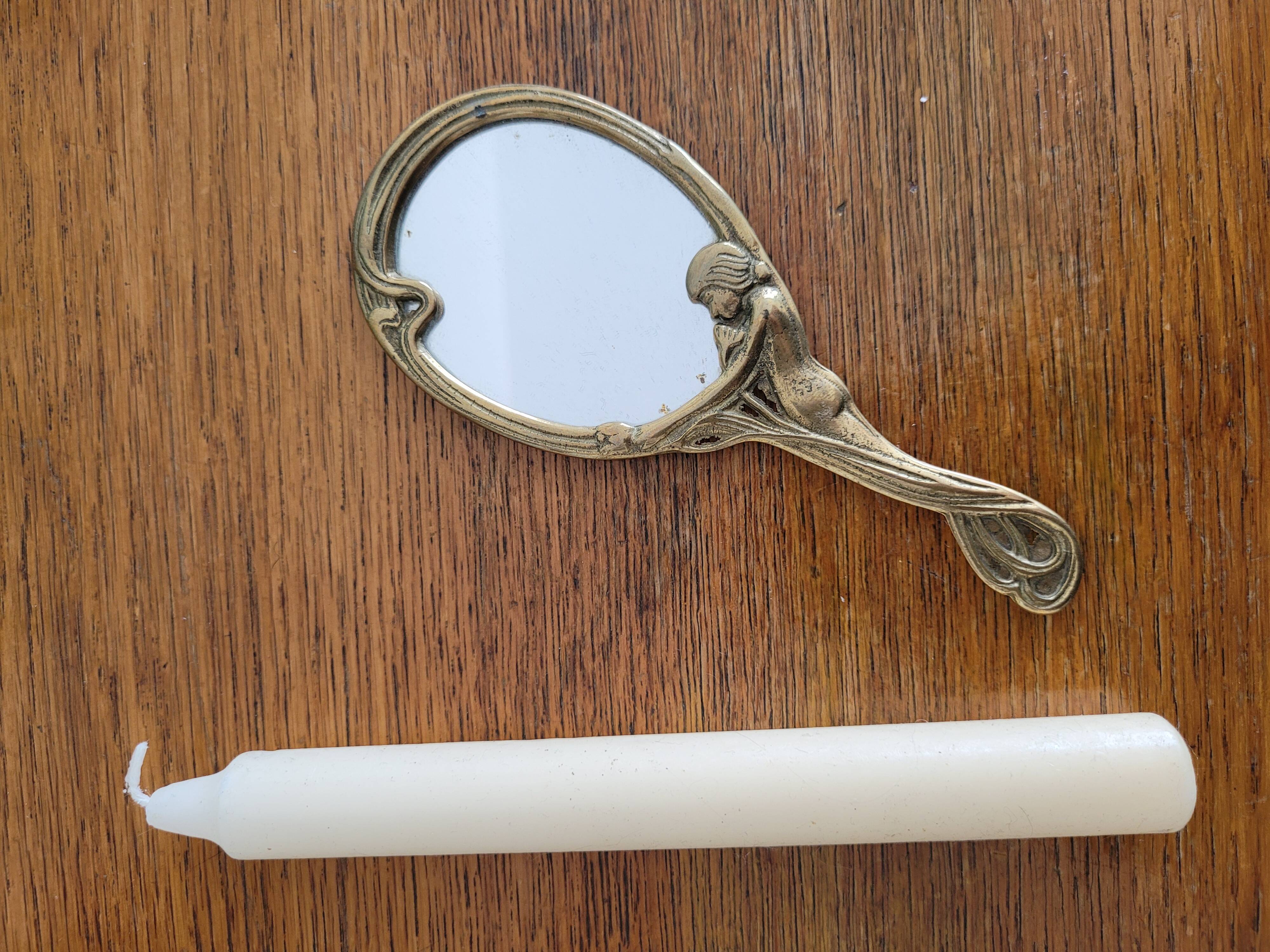 Art Nouveau brass hand mirror