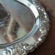 Silver-coloured metal plate