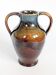Vintage ceramic amphora vase, Fat Lava glaze, classic decor.