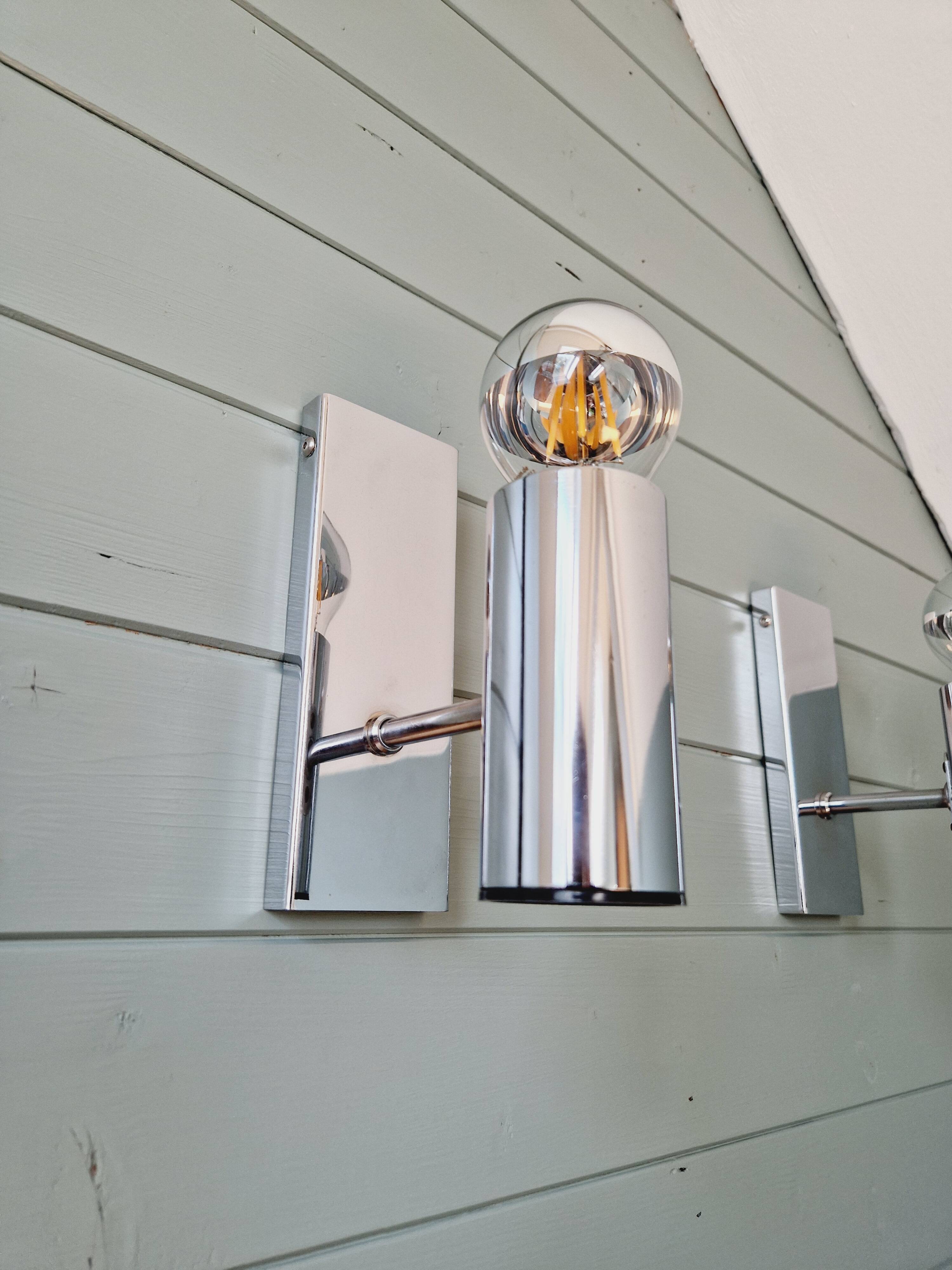 Pair of tubular chrome-plated metal wall sconces, 1970s