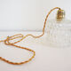 Suspension made with a vintage glass globe