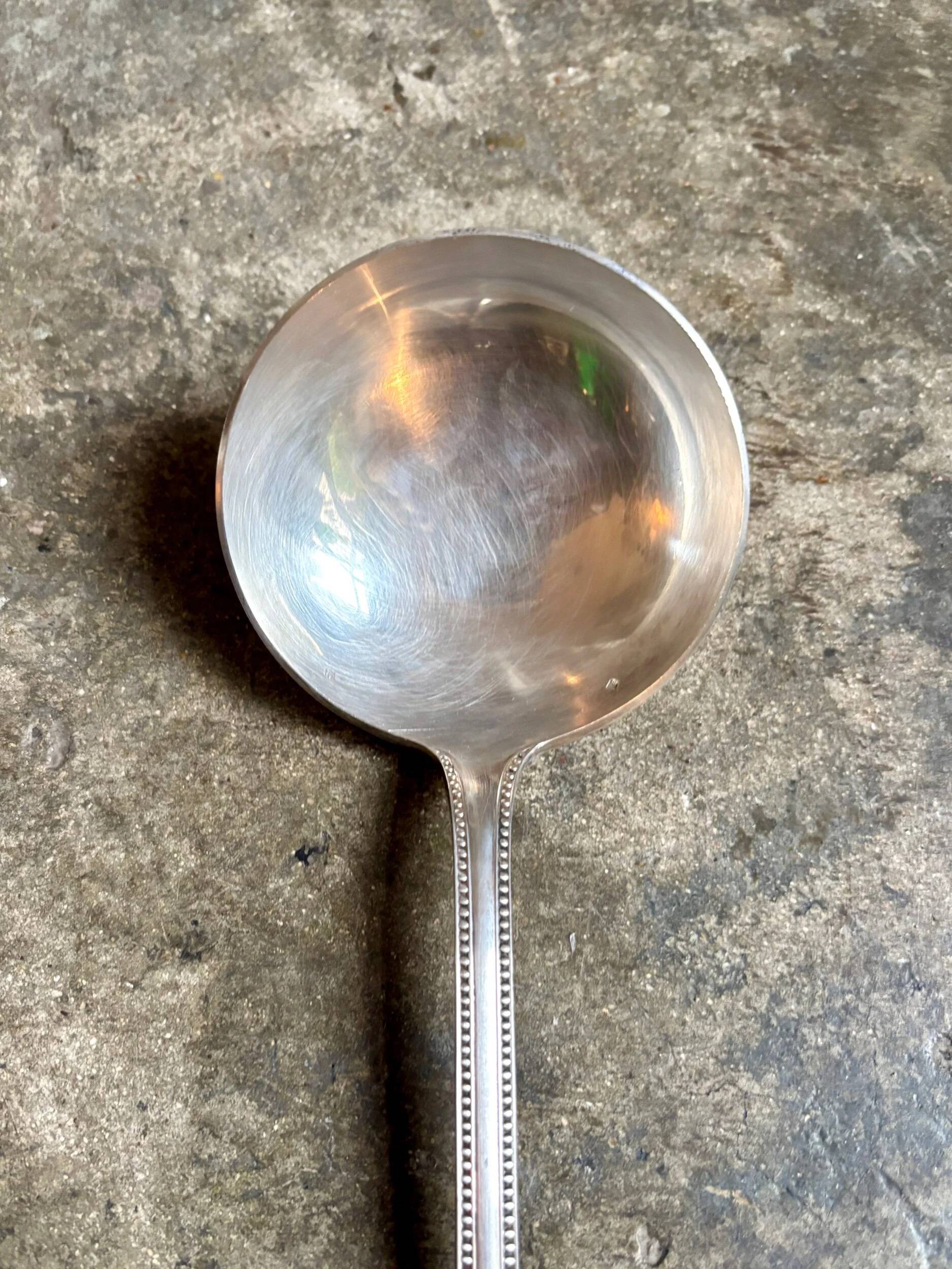 Silver-plated metal ladle, beaded decoration no. 2