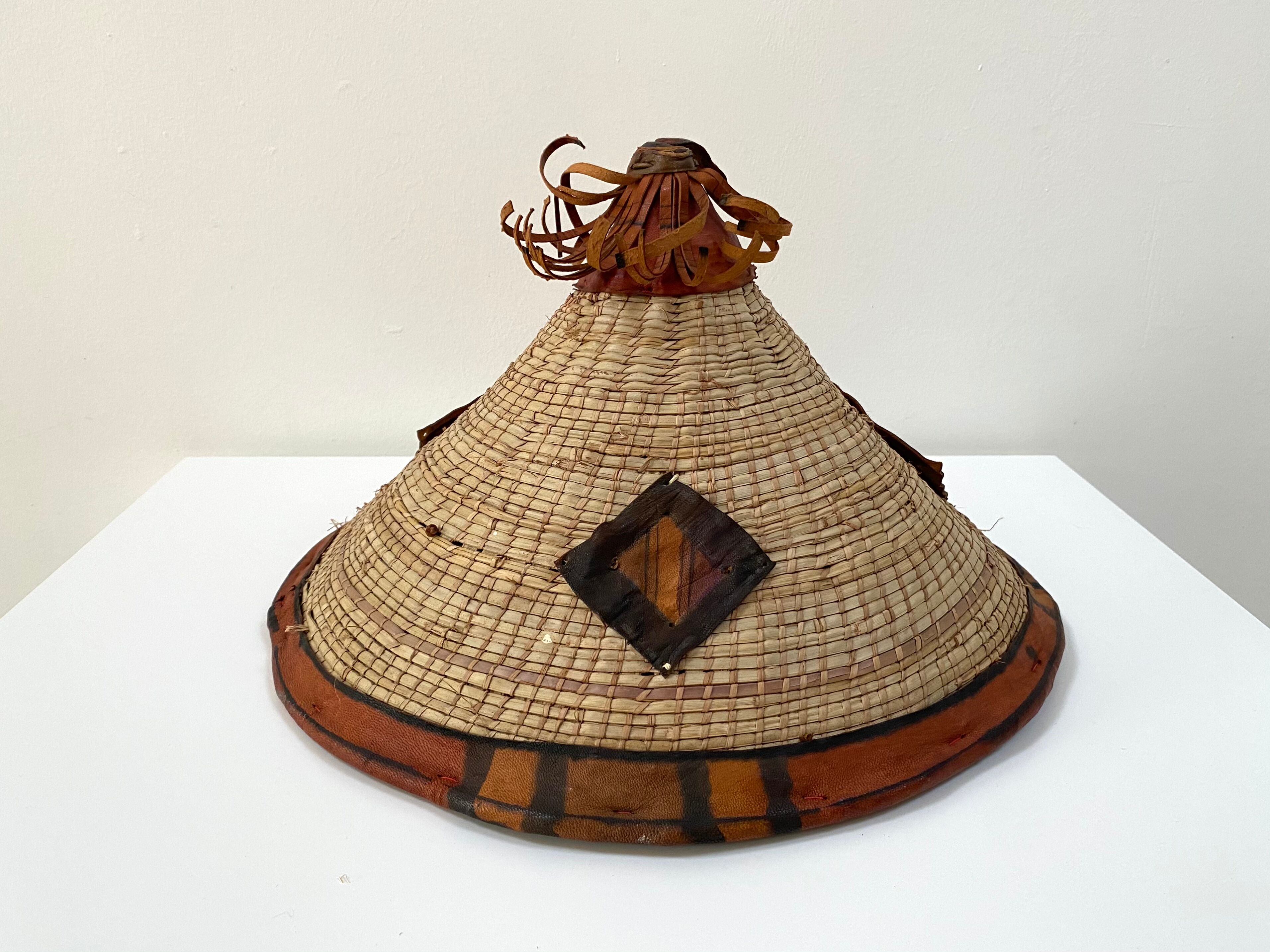Traditional African Fulani hat in leather and woven straw