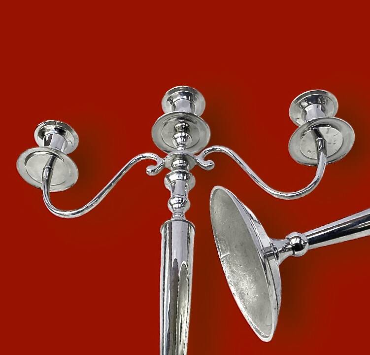 Pair of vintage three-armed chrome metal candlesticks