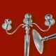 Pair of vintage three-armed chrome metal candlesticks