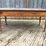 Antique cherry farmhouse table with 2 drawers and 1 pull-out