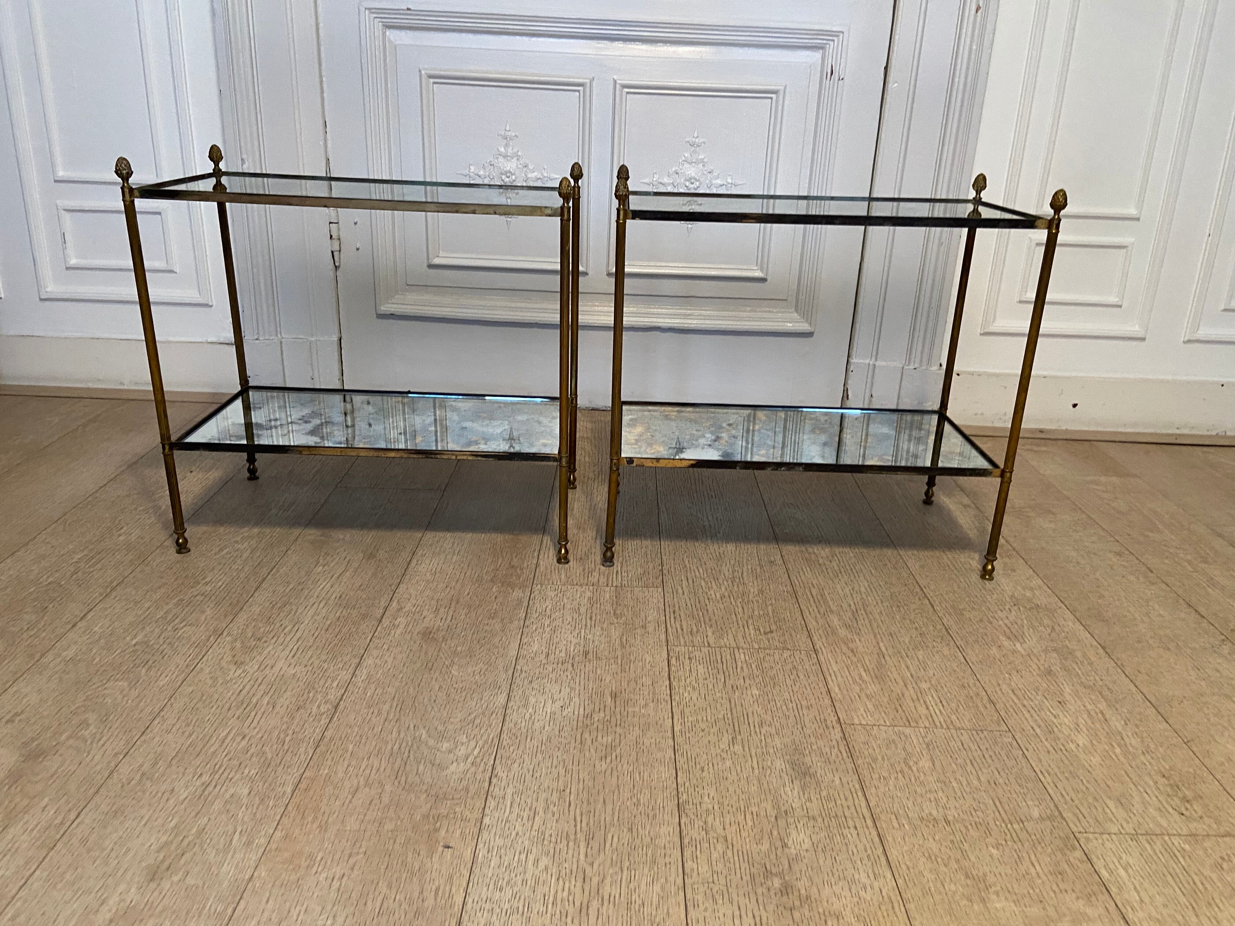 Pair of neo classic brass side tables and oxidized mirror