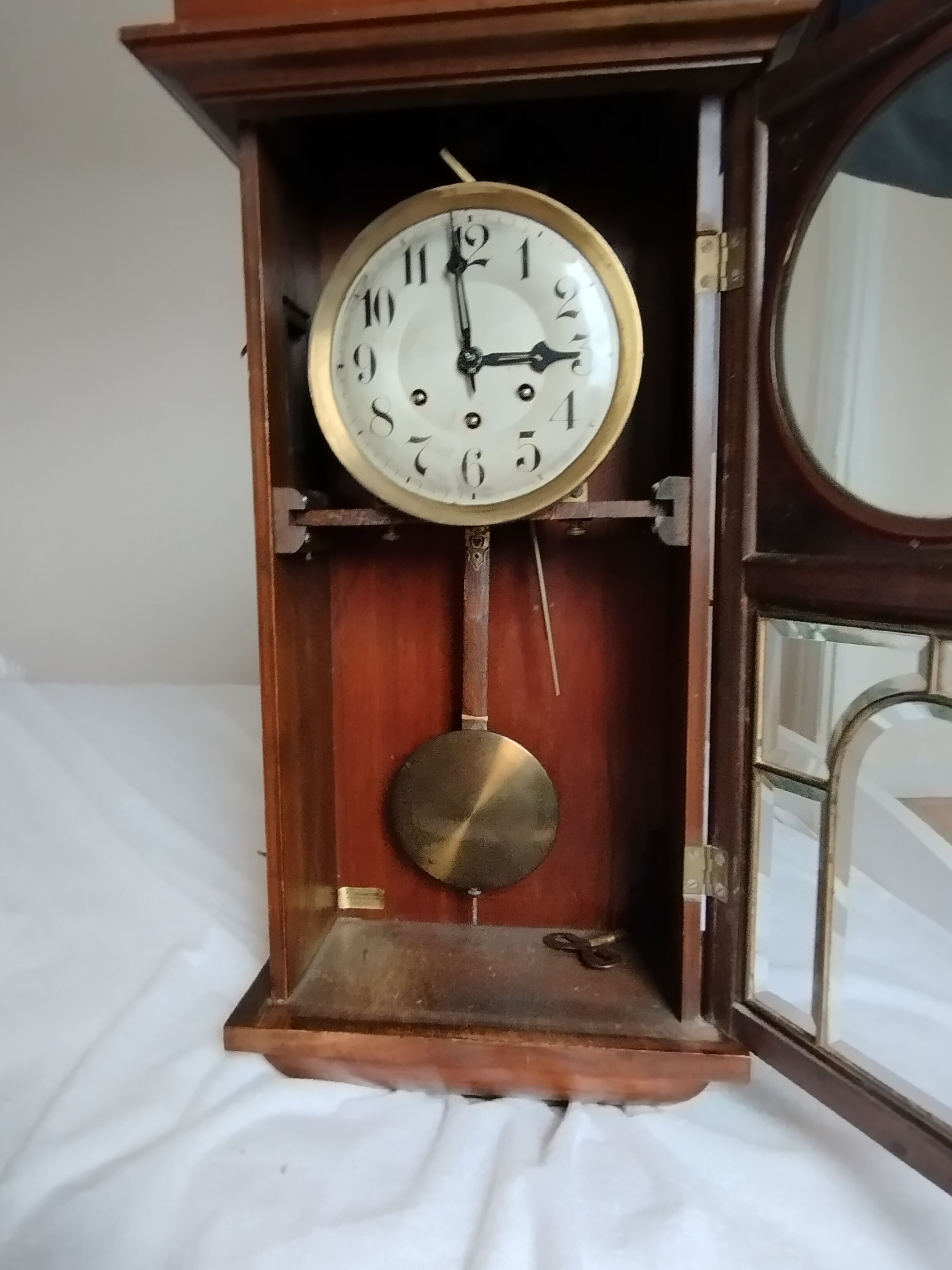 Wooden clock with beveled glass