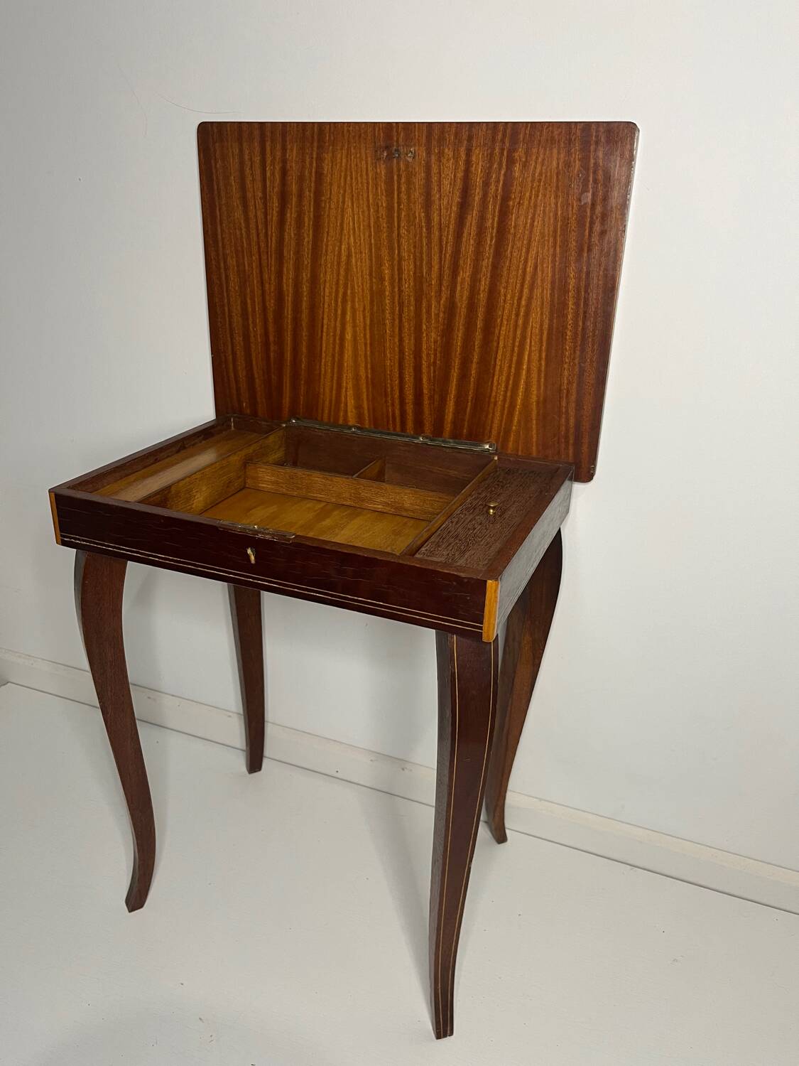Small antique Italian inlaid table with Swiss music box.