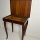 Small antique Italian inlaid table with Swiss music box.