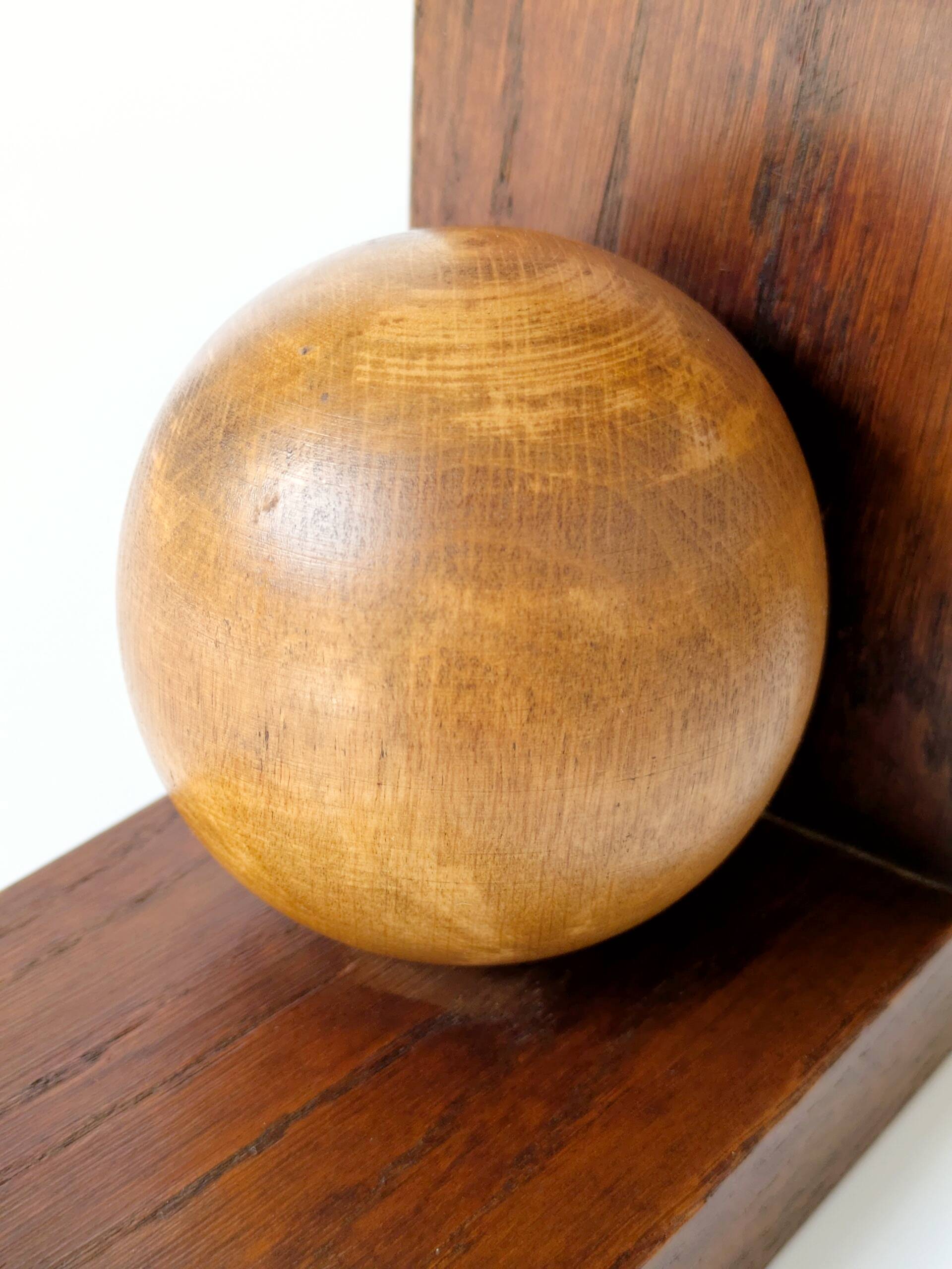 Pair of antique oak ball bookends, Midcentury Art Deco