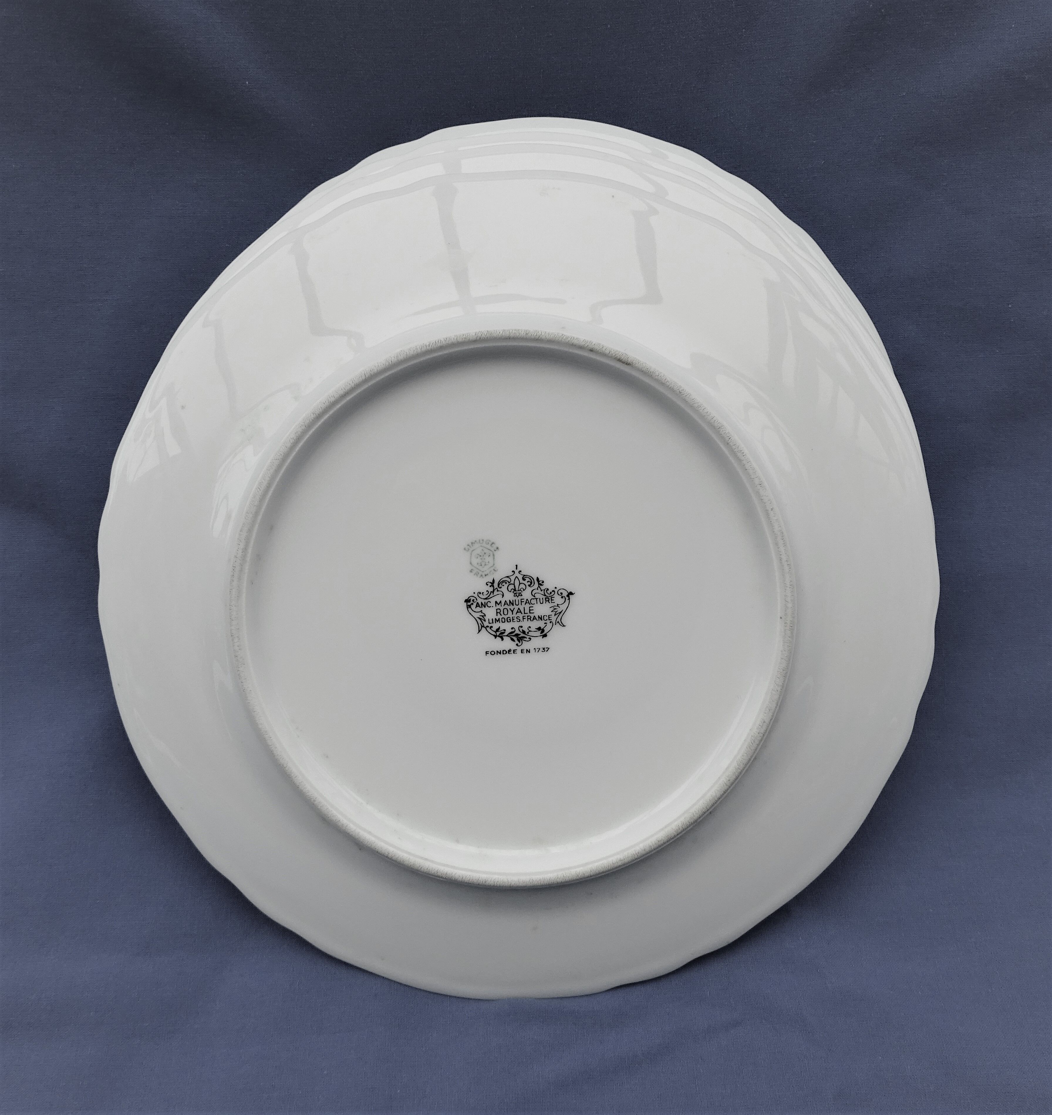4 White de-serve plates Limoges