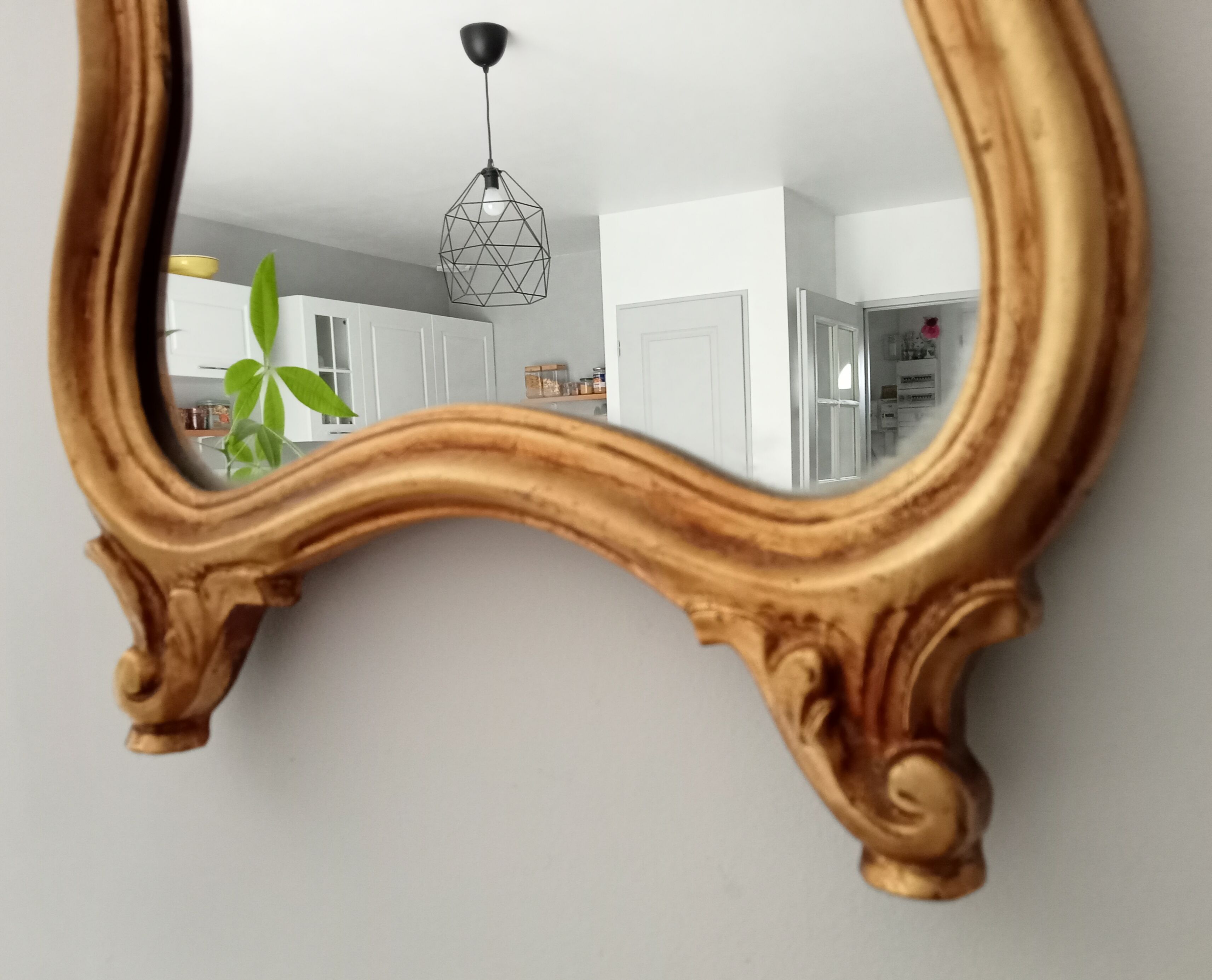 Vintage rocaille mirror in gilded wood
