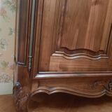 Regency bookcase in solid cherry wood stained walnut.