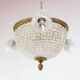 Old bronze ceiling light and 3 tulip flowers