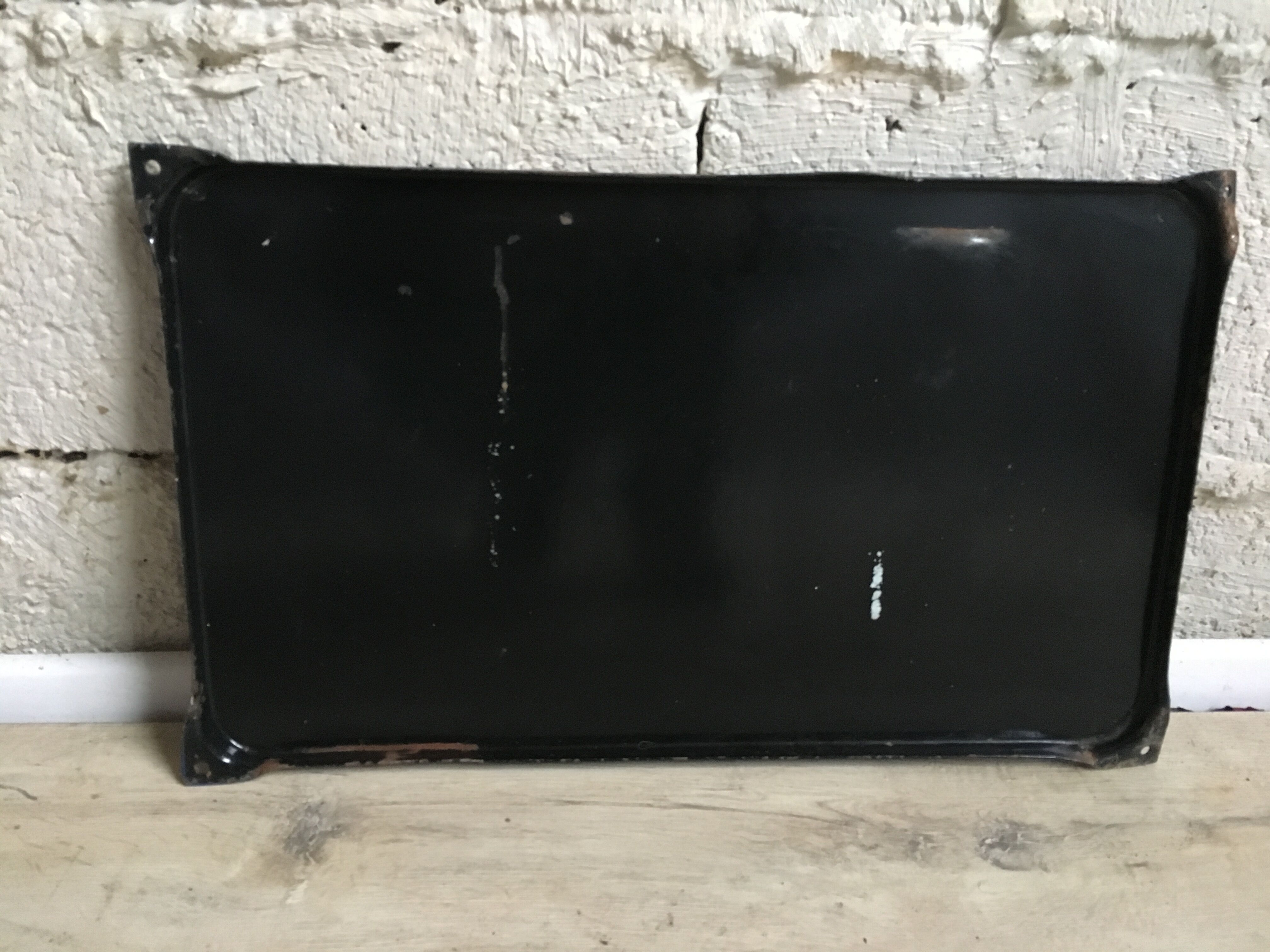 Enamelled old street sign