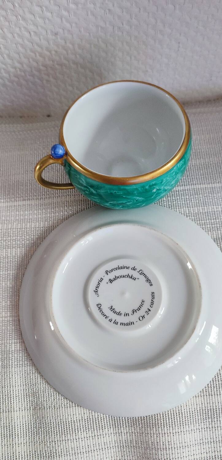 Two Artoria Babouchka Limoges porcelain cups and saucers