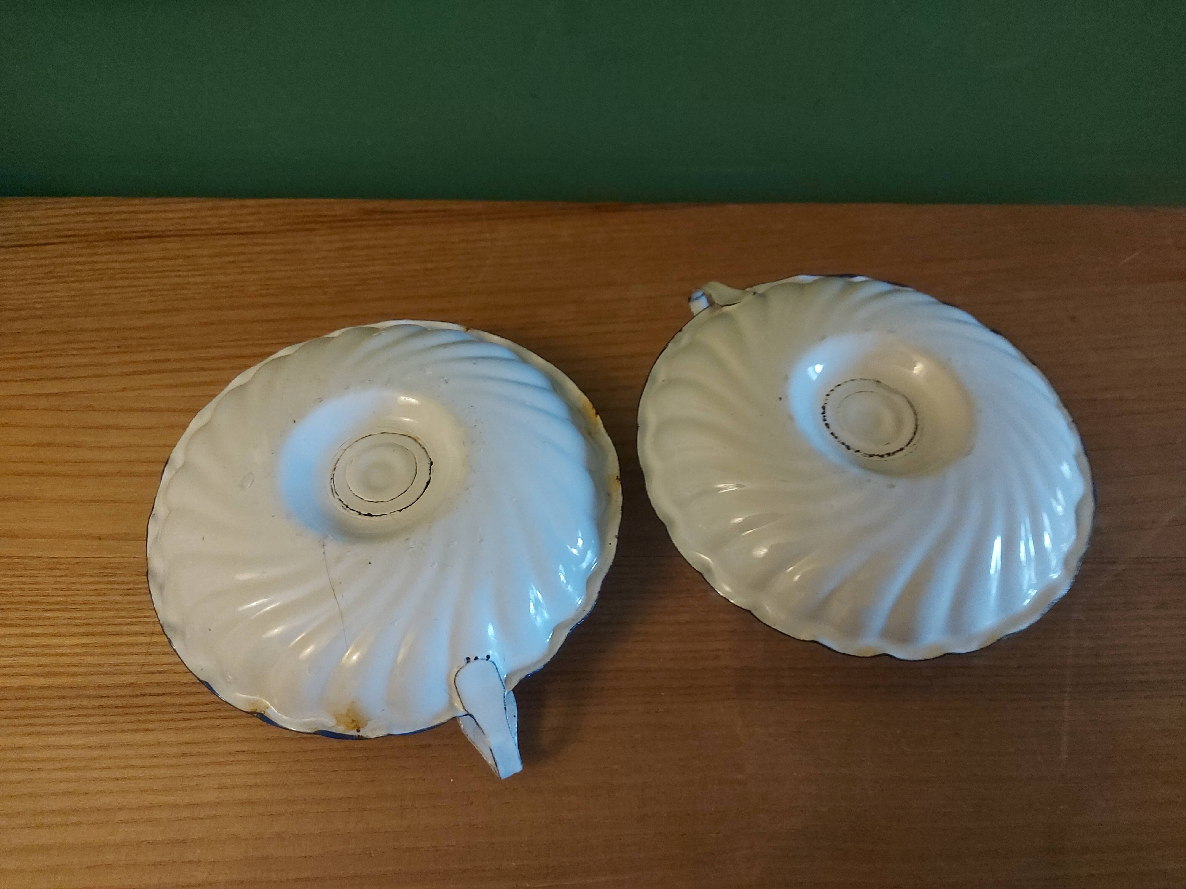 Pair of enamelled candle holders