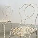 Set of two sculptural French garden chairs