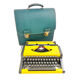 Machine à écrire Olympia AEG Dactymétal De Luxe Jaune révisée ruban neuf avec valise verte