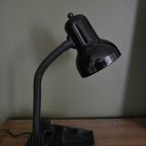 Black flexible desk lamp with built-in flashheld