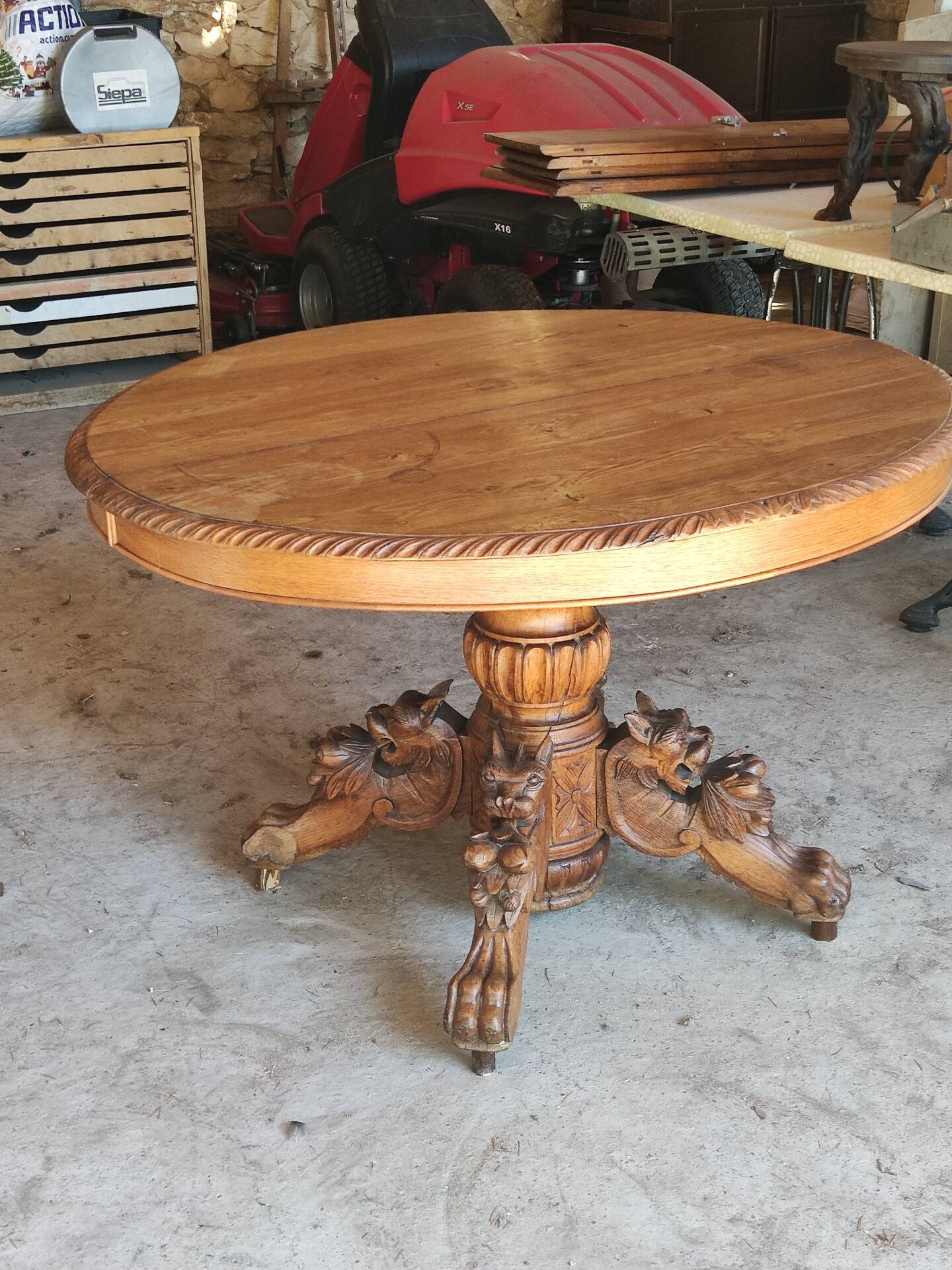 Oval oak table with carved details - known as a hunting table.