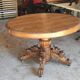 Oval oak table with carved details - known as a hunting table.