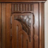 Old solid wood wardrobe with three vintage mirror doors