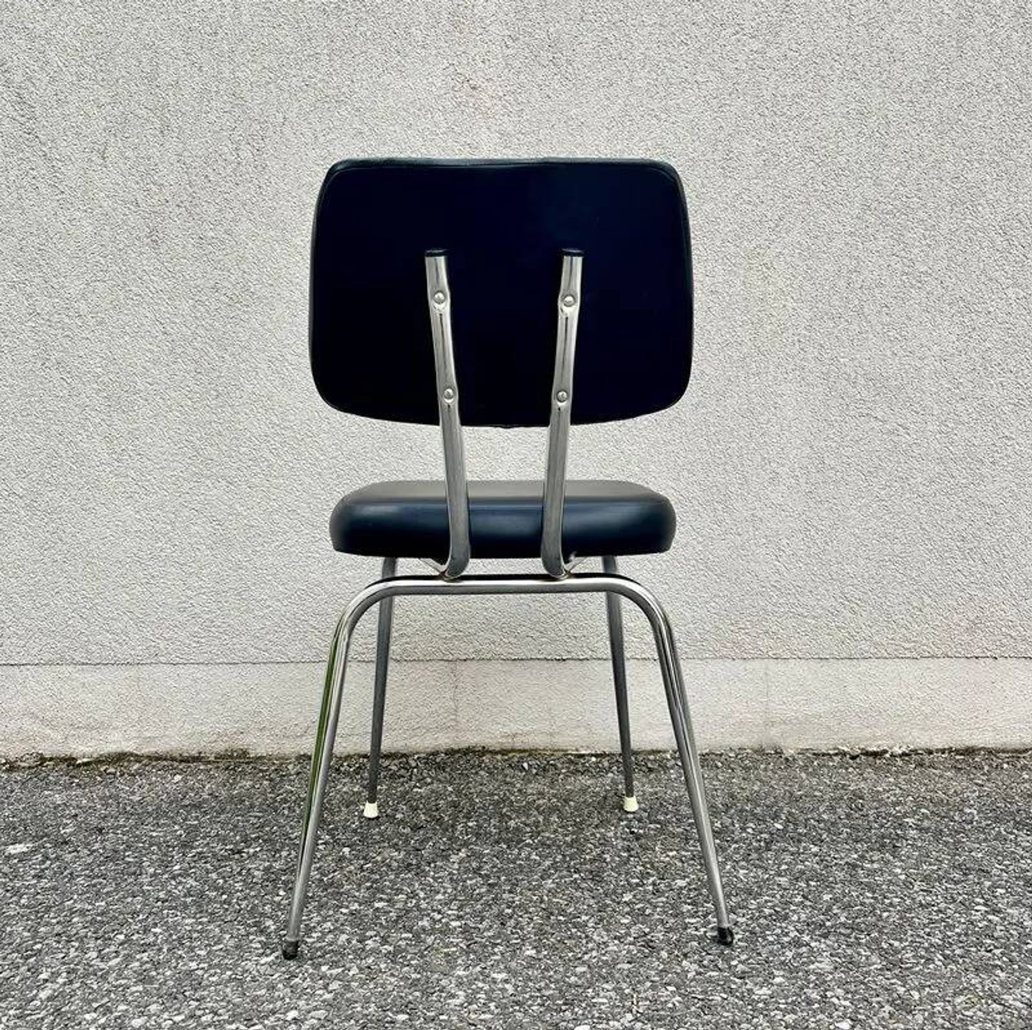 Black faux leather office chair