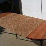 Extendable panel with pans on wheels in cherry