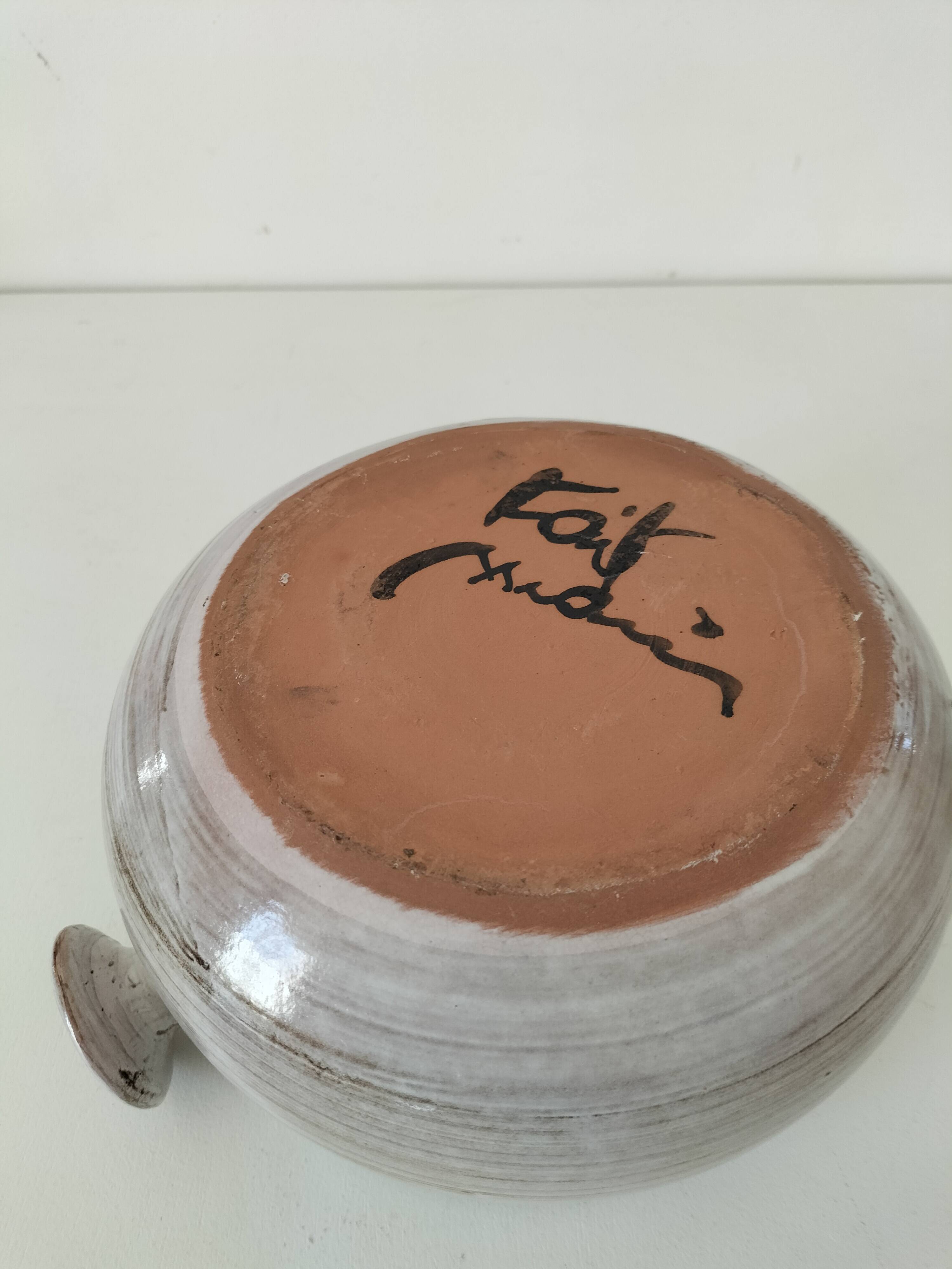 Glazed stoneware dish with floral motif