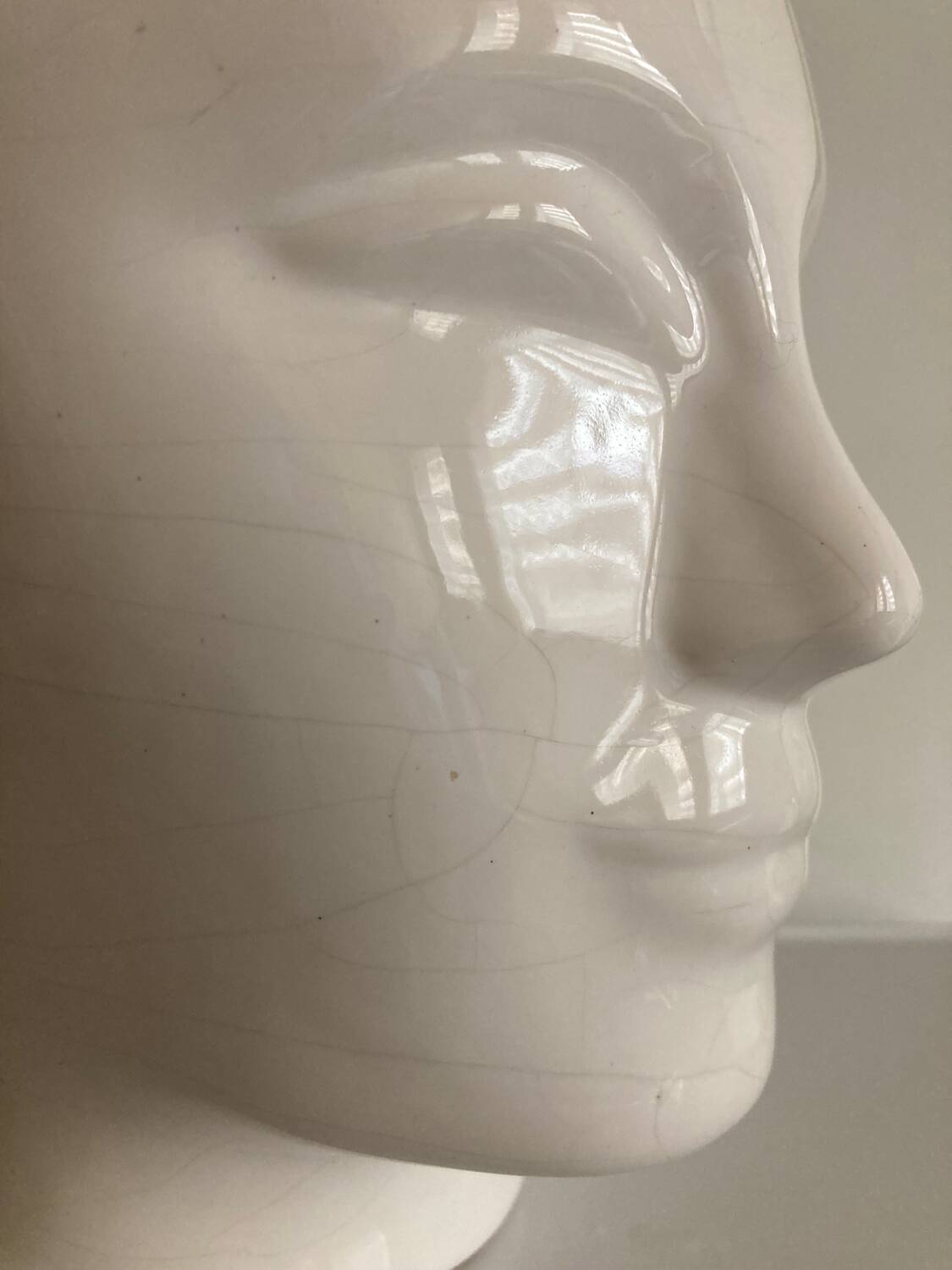 Vintage white ceramic face-shaped vase or planter