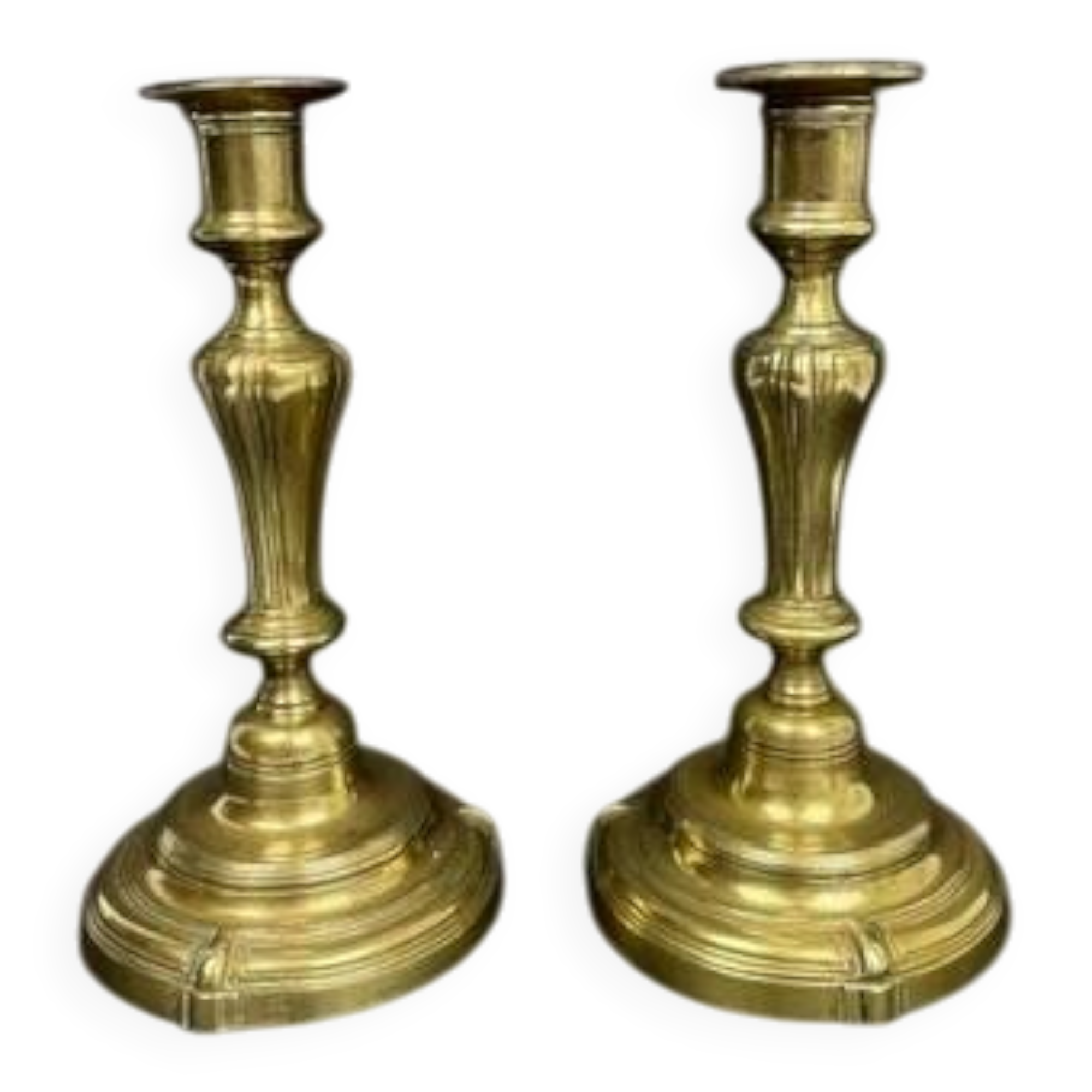 Pair of gilded bronze candlesticks from the Regency period, 18th century.