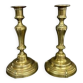 Pair of gilded bronze candlesticks from the Regency period, 18th century.